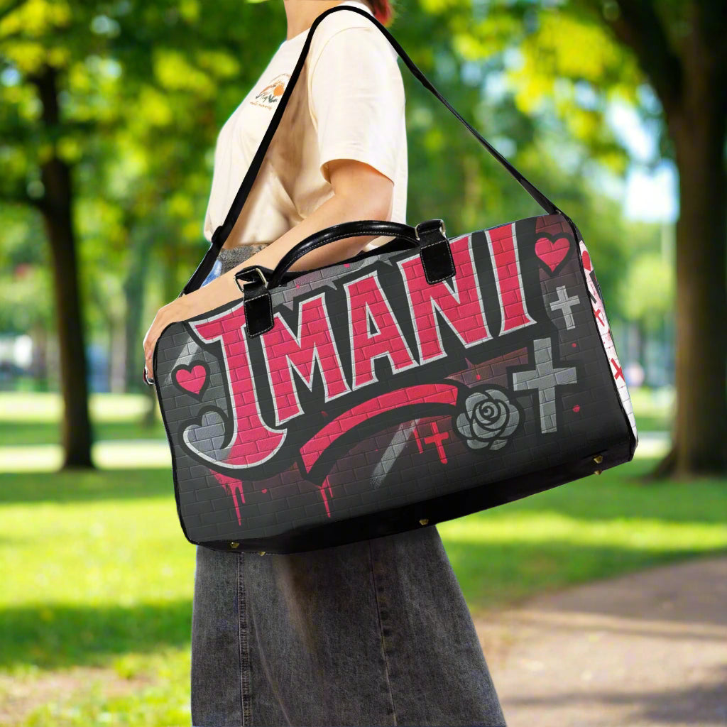 Personalized Imani travel bag with red, black and white graffiti-style name, hearts, and rose details on durable nylon with leather handles