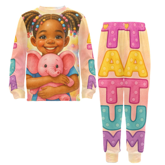 Long sleeve pastel kids pajama set featuring smiling African American girl with pigtails and pink elephant, plus colorful Tatum name design.