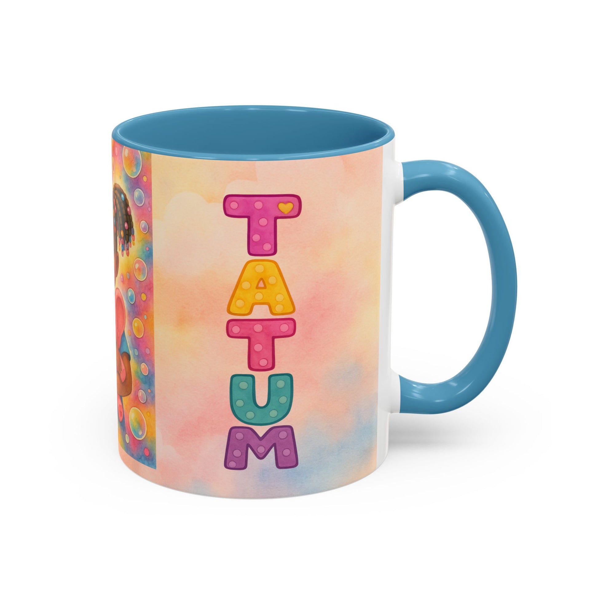 Pastel kids ceramic mug featuring smiling African American girl with pigtails and a pink elephant, with colorful Tatum name design on reverse.