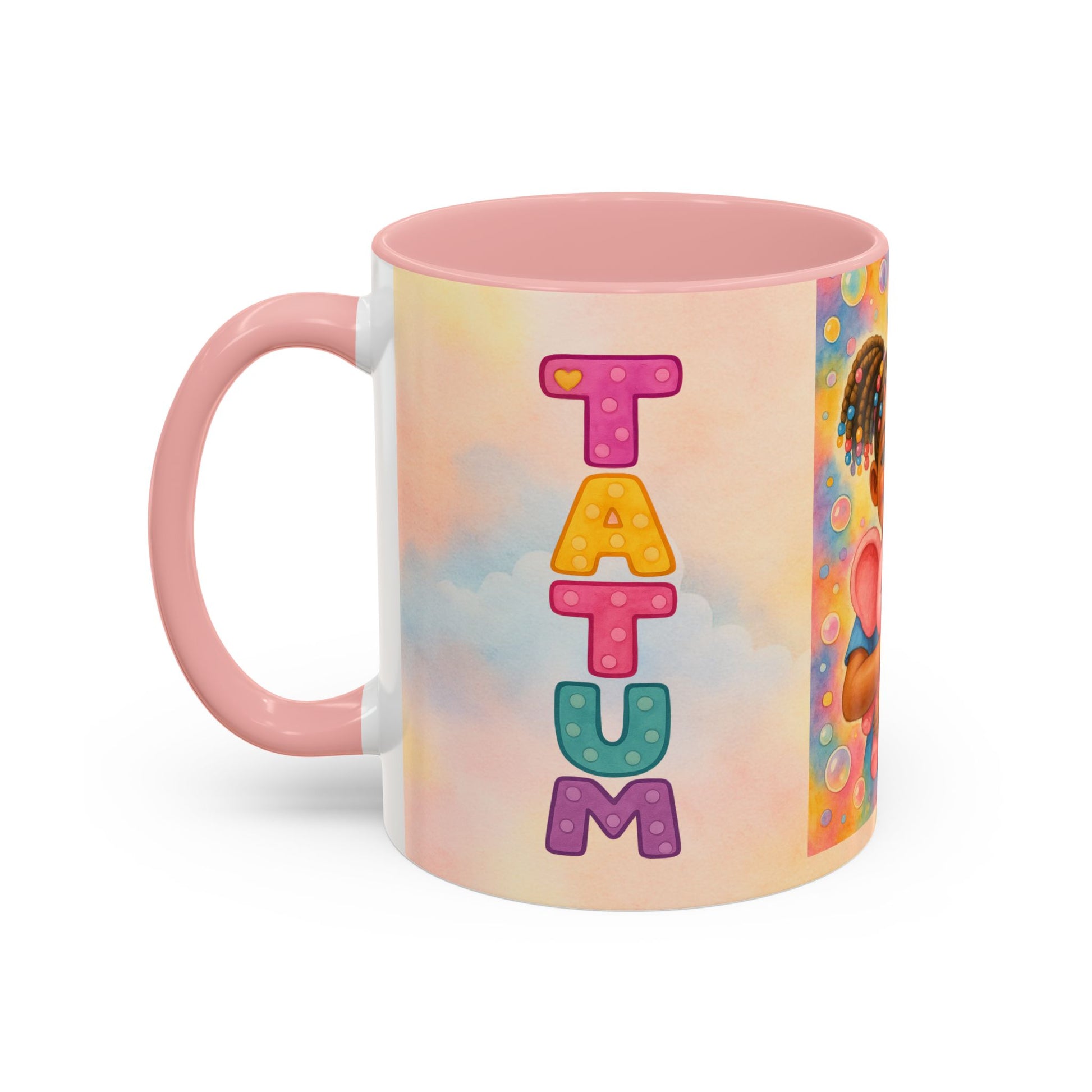 Pastel kids ceramic mug featuring smiling African American girl with pigtails and a pink elephant, with colorful Tatum name design on reverse.