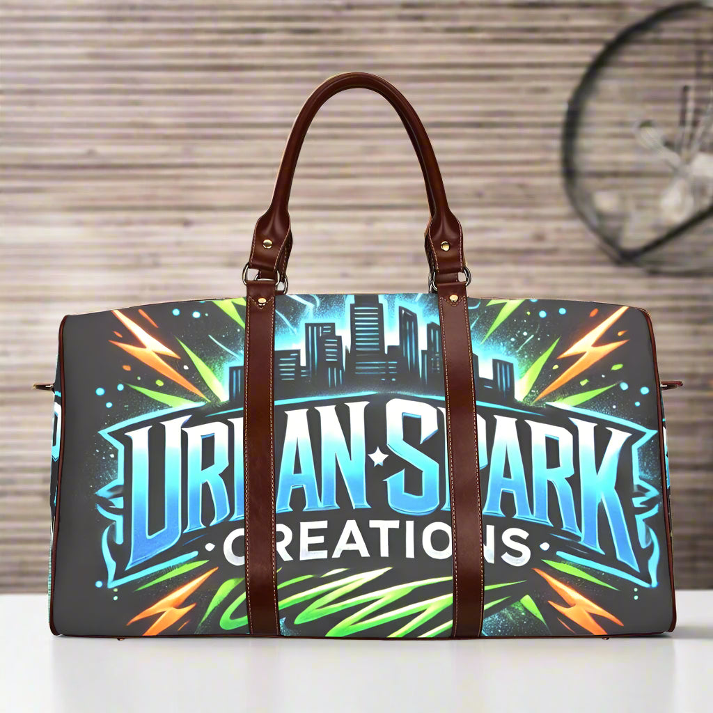 Urban Spark Creations duffel bag with city skyline, electric blue and neon green graphic, and brown leather straps
